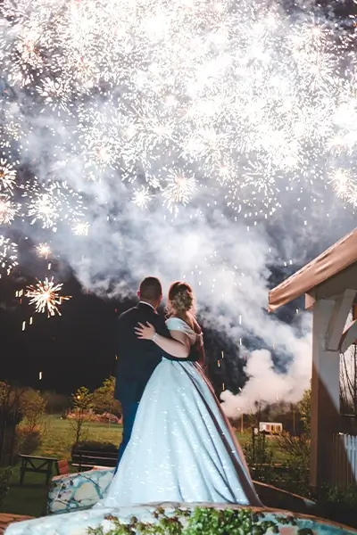 A wedding ceremony ending with beautiful smoke and fireworks